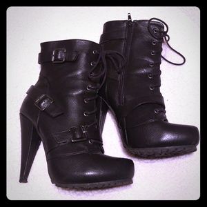 Black heeled "rocker" boots
